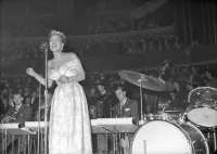 DIVA exhibition at Kunsthal Rotterdam, photo Photographic negative, Billie Holiday at her only ever London appearance at the Albert Hall. Jack Parnell band backing her, photographed by Harry Hammond, Engeland, 1954 © Victoria and Albert Museum, London